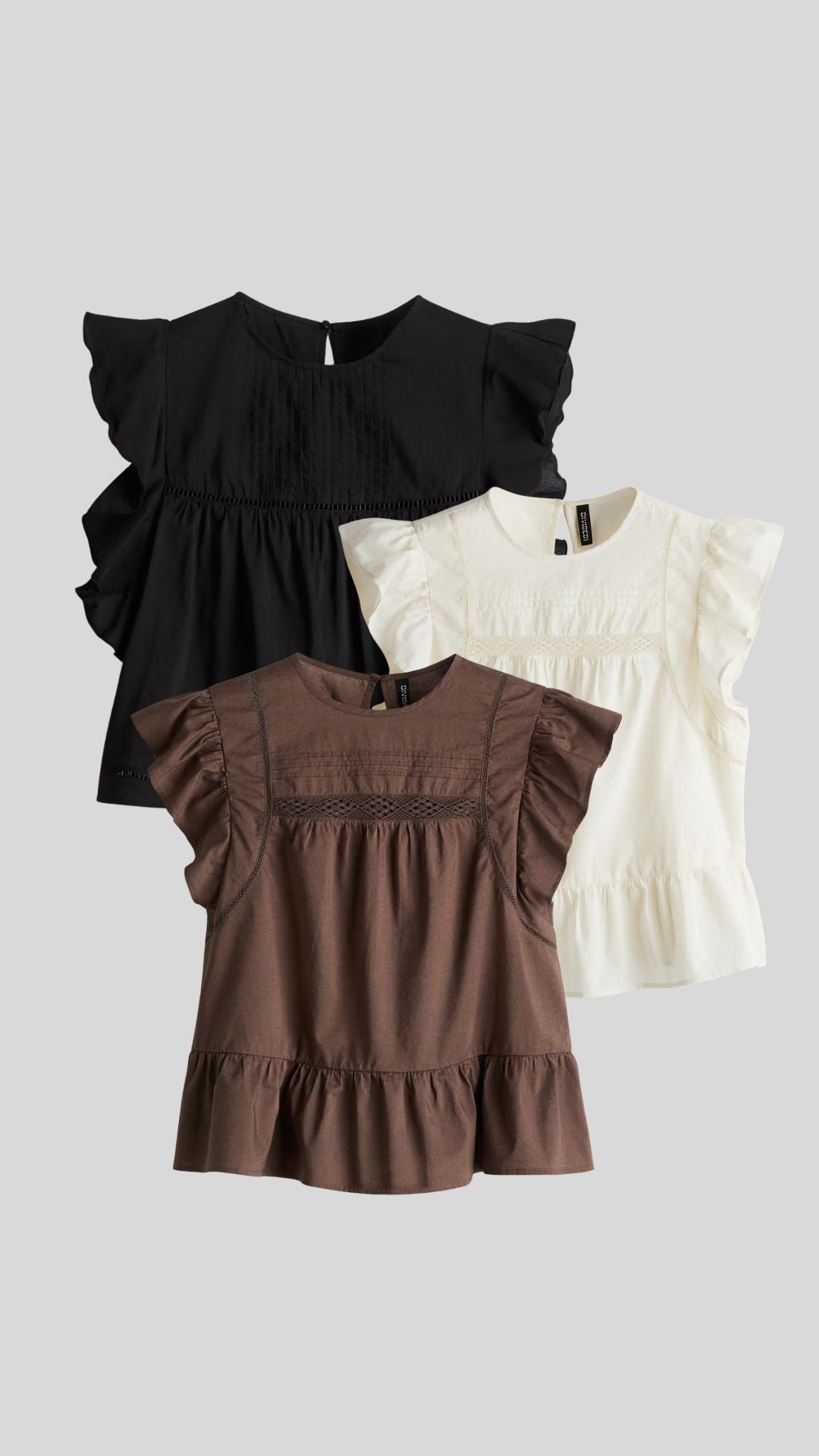 Blusa con inserciones de encaje y peplum